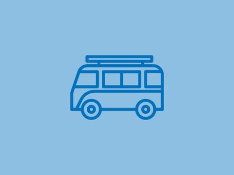 A simple blue outline of a bus against a light blue background. The bus has a flat roof and large windows.