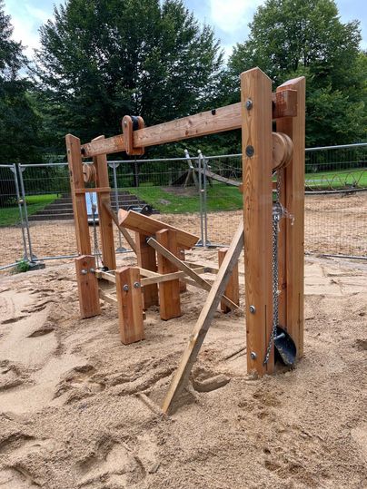Climbing device on a playground with sand