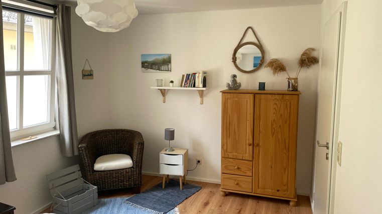 The small bedroom features a reading corner - a small selection of books is available to you.