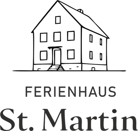 A simple, sketched holiday home with a gabled roof and several windows. Below is the inscription "Holiday Home St. Martin".