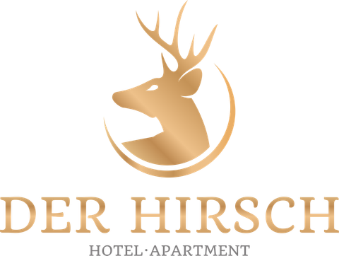 An elegant logo featuring a stylized deer head in gold tones. Below it is the text “DER HIRSCH HOTEL·APARTMENT” written in clear font.