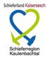 The logo shows the words "Schieferregion Kaulenbachtal" at the bottom. Above it is a stylized heart formed from a green and a blue intersecting arrow.