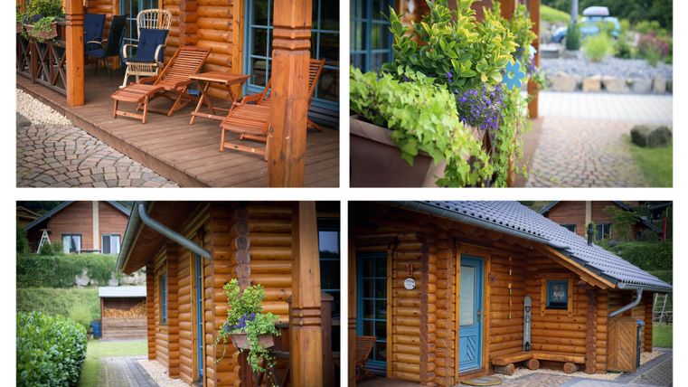 A cozy wooden house with an inviting porch. Lush plants and garden furniture create a relaxing atmosphere.