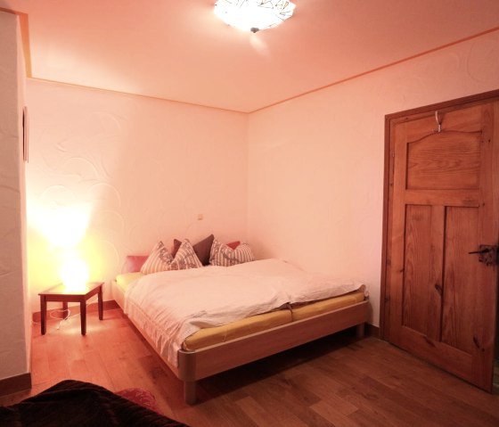 Schlafzimmer in der Ferienwohnung Tankstopp, © Familie Berens