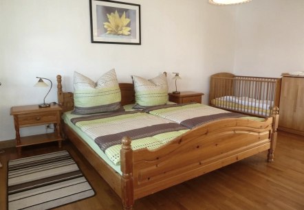 Bedroom 1, with crib
