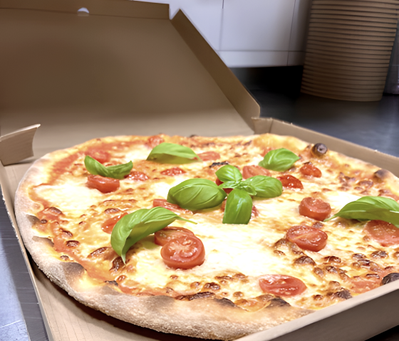 Pizza mit Tomaten, Büffelmozzarella und Basilikum, © Toni`s Pastaria