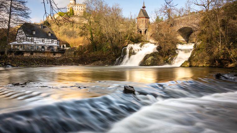 Historic mill and waterfall on the Pyrmonter Felsensteig.