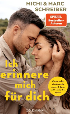 Ein Mann sitzt nachdenklich mit einer Hand an seinem Kopf. Er trägt einen Anzug und hat einen gepflegten Bart.