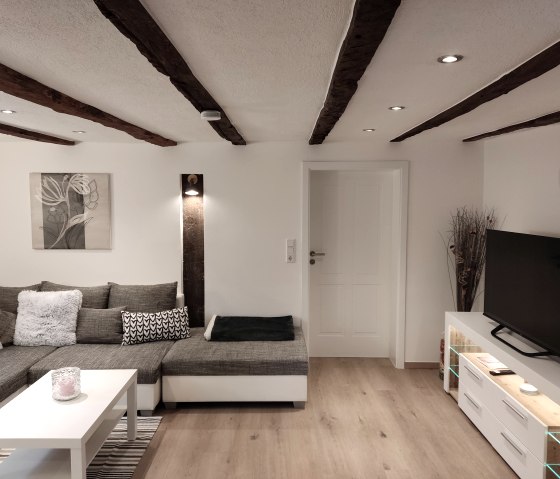 Wohnzimmer, © Nordeifel Tourismus GmbH & Ferienwohnung Antweiler
