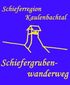 Le logo du sentier est bleu. En haut, on peut lire en jaune "Schieferregion Kaulenbachtal" et dans la partie inférieure "Schiefergrubenwanderweg". Au milieu du logo, une tour d'extraction est dessinée en jaune.
