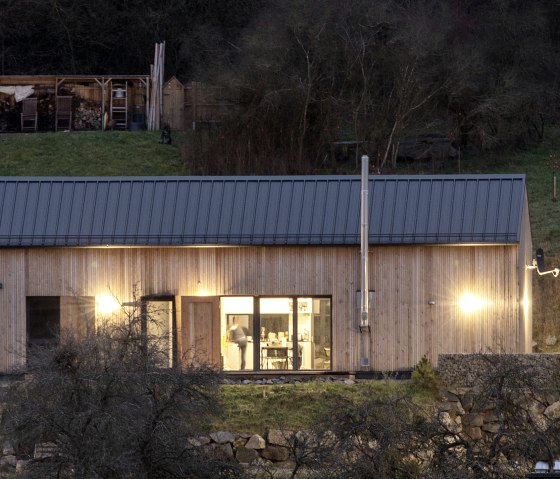 Front view of the entrance at dusk, © ATTIA FOTOGRAFIE