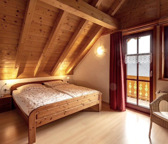 Bedroom upstairs, © Nordeifel Tourismus GmbH & Ferienhaus Linden