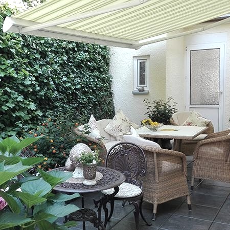 Terras met zonwering